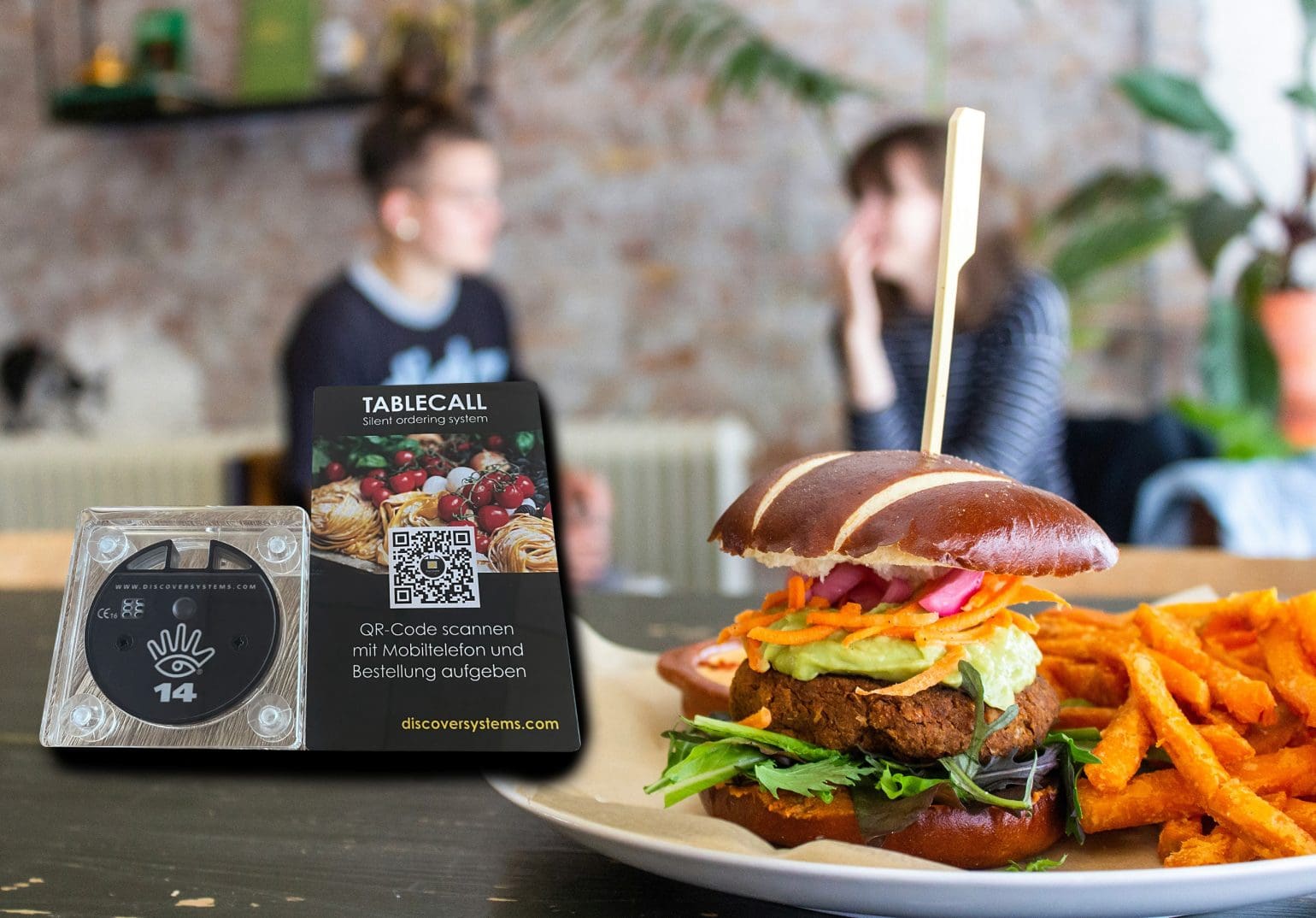 TableCall, ringer system på en bild av en hamburgerrätt