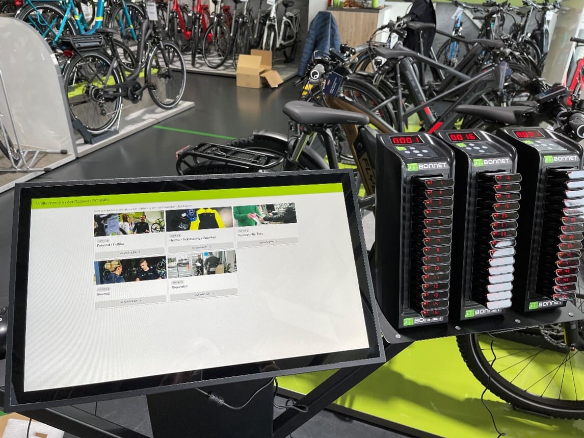 Självbetjäningskiosk med pagersystem i cykelbutik